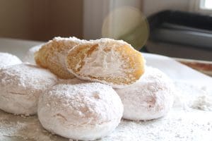 Powdered Sugar-Coated Cream Filled Donuts (half doz.)
